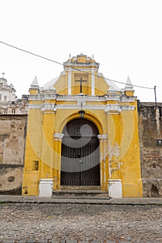 Chapel  Way of the Cross stations in street of thesteps of La Antigua Guatemala. Antique door in antigua Guatemala.