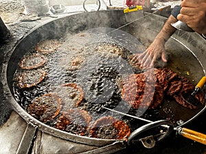 Chapli kabab is a Pashtun-style minced kebab usually made with beef and is a popular street food throughout South Asia photo