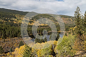 Chapman Reservoir surrounded with colorful autumn trees.