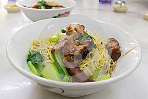 Char Siew Barbecue Pork Wanton Noodles on Table Closeup