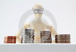 Character with glasses looking at coins.