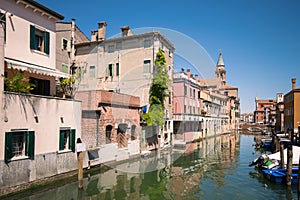 Characteristic canal in Chioggia, lagoon of Venice.