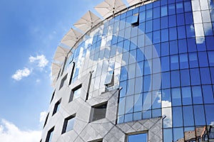 Characteristic glass facade of a modern office building in Budapest