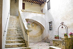 Characteristic Italian village. Courtyard with pretty well