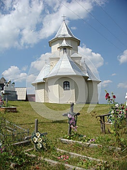 Characteristic white church  in Romania to the frontier with the Ukraine.