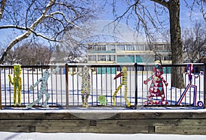 Characters on a school fence