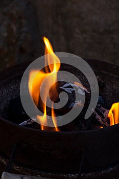 Charcoal flame and ember photo