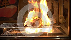 Charcoal flame fire over grilling yakitori Japanese style chicken skewers traditional izakaya food 4k