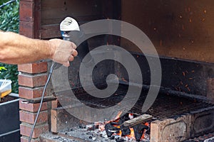 Charcoal getting blown on with hairdryer