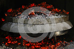 Charcoal grill puffed cooking close up soft focus