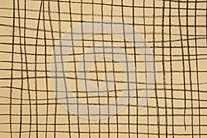 Charcoal pattern drawing on yellow paper background texture