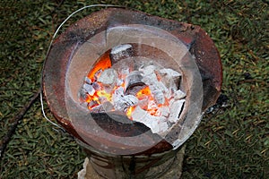 Charcoal in stove with fire on garden at thailand