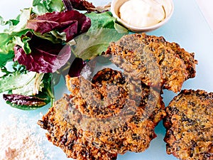 Chard pancakes with garlic and chickpea flour with green salad