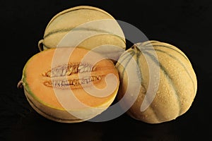 Charentais with half on black background