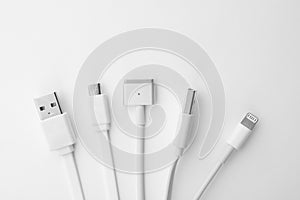 Charge cables on white background. Modern technology