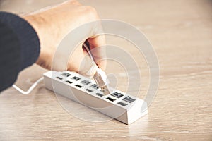 Charger on wooden table background. electronic device