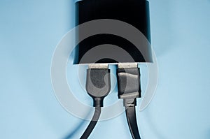 Charging block with a cord
