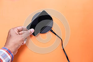 Charging Smartphone Using Wireless Charging Pad, top view