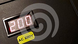 Charging Station Indicator Shows 200 With AC 220V Label During Use in a Facility