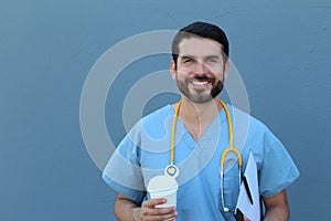 Charismatic doctor having a break in the staff room