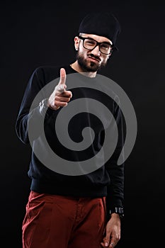 Charismatic guy in a black sweater , emotions