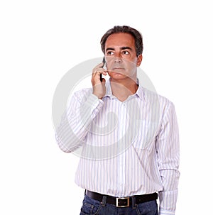 Charismatic male speaking on his cellphone