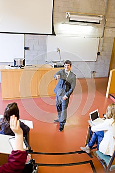 Charismatic teacher interacting with students