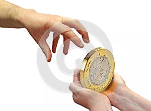 Charity donation hand gold coin money cash pound donations aid