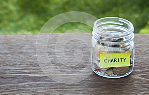 Charity donation money glass jar