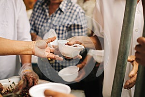 Charity food is the hope of the poor who have no money: concept of begging food : Volunteers Share Food to the Poor to Relieve