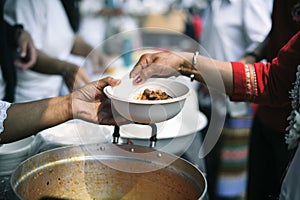 Charity food is the hope of the poor who have no money: concept of begging food : Volunteers Share Food to the Poor to Relieve