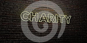 CHARITY -Realistic Neon Sign on Brick Wall background - 3D rendered royalty free stock image