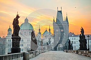 Charles Bridge Karluv Most and Lesser Town Tower scenic view at sunrise, Prague, Czech Republic