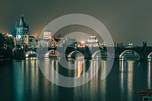 Charles Bridge at night in Prague, Czech Republic