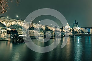 Charles Bridge at night in Prague, Czech Republic