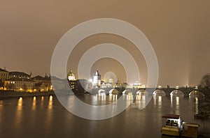 Charles bridge and other historic buildings at night, Prague, Czech republic