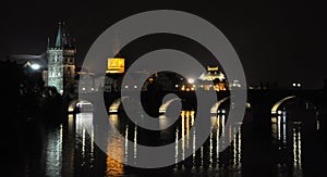 Charles bridge over the Vltava in the moonlight. Prague, a warm summer night.