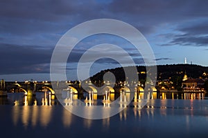 Charles Bridge and Petrin Hill in Prague at night