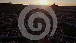 Charles Bridge and Prague panorama, aerial view at sunset