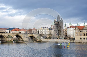 Charles Bridge Prague with Police boat on patrol