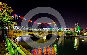 The Chamberlain Swing bridge and Parliament buildings in Bridgetown, Barbados at Christmas and Independence photo