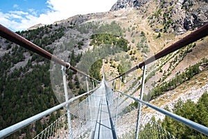 Charles Kuonen suspension bridge in Swiss Alps. With 494 metres, it is the longest suspension bridge in the world in