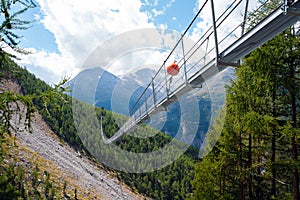 Charles Kuonen suspension bridge in Swiss Alps. With 494 metres, it is the longest suspension bridge in the world in