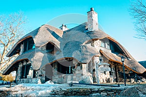 Charlevoix, MI /USA - March 3rd 2018:  The Thatch House an Earl Young Mushroom House in Charlevoix Michigan