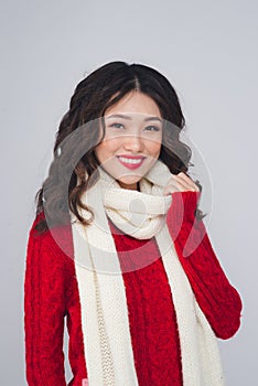 Charming asian young woman in winter clothing