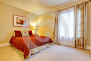 Charming bedroom with beautiful red bedding