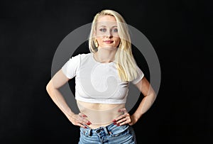 Charming blonde girl with uncovered belly