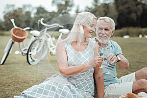 Charming blonde woman leaning on her man