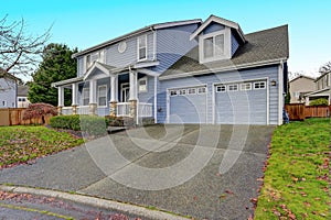 Charming blue two story home with a nice covered porch.