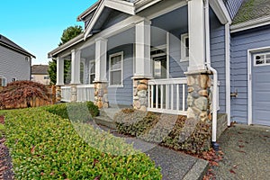 Charming blue two story home with a nice covered porch.